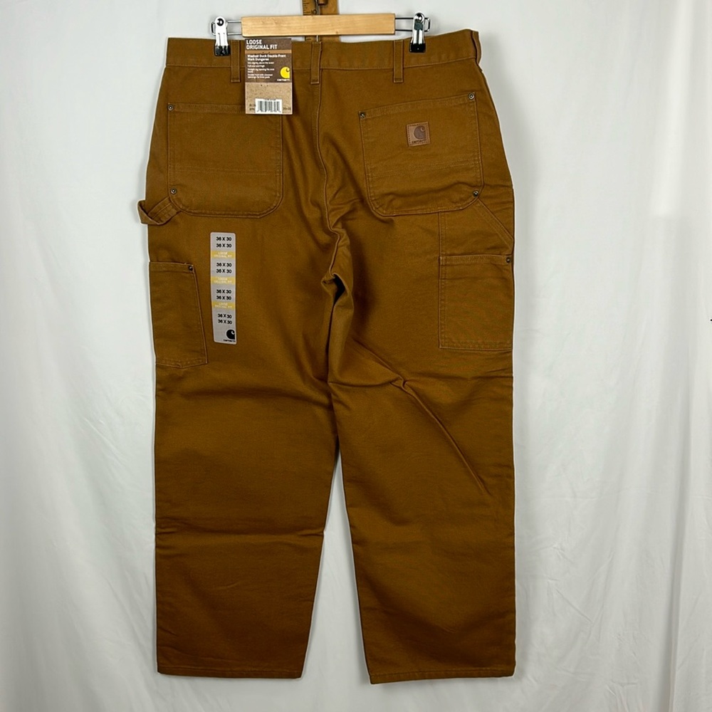 New with tags. Loose original fit, Carhartt work dungaree size 36 x 30 brown.